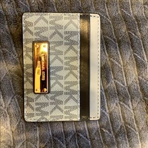 Michael Kors card holder. NEVER USED